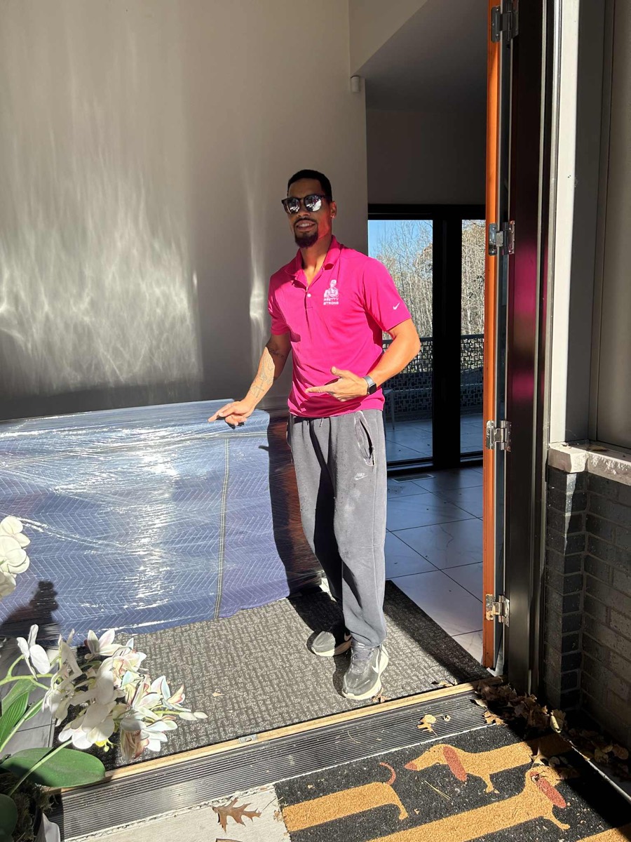 Ty from the Pretty Strong Movers crew at a customer's home